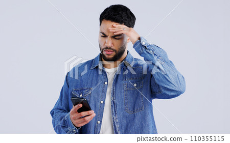 Man, smartphone and frustrated with doubt for notification, online news and studio background. Arab, male or hands with question on face, shocked expression or reading gossip on cellphone in surprise 110355115