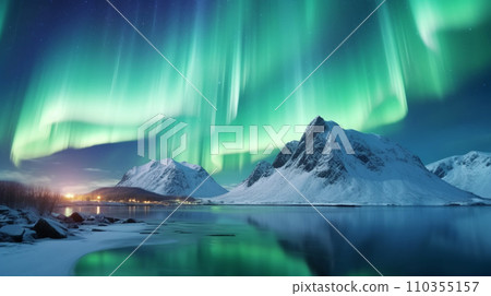 Aurora in the sea, snowy mountains, street lights at night. Northern Lights in Lofoten Islands, Norway 110355157