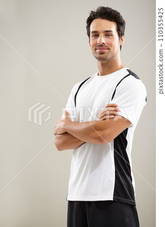 Arms crossed, portrait or athlete in studio for fitness workout, sports exercise or healthy wellness. Mockup space, grey background or man ready to start training with confidence, discipline or pride Arms crossed, portrait or athlete in studio for fitness workout, sports exercise or healthy wellness. Mockup space, grey background or man ready to start training with confidence, discipline or pride 110355425