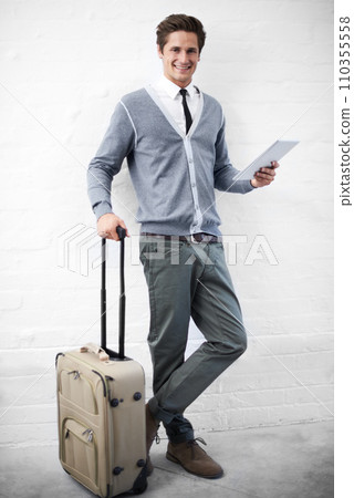 Business man, case or luggage with tablet, portrait and smile with app, flight or travel by wall background. Entrepreneur, person or employee with digital touchscreen, bag and happy for immigration Business man, case or luggage with tablet, portrait and smile with app, flight or travel by wall background. Entrepreneur, person or employee with digital touchscreen, bag and happy for immigration 110355558