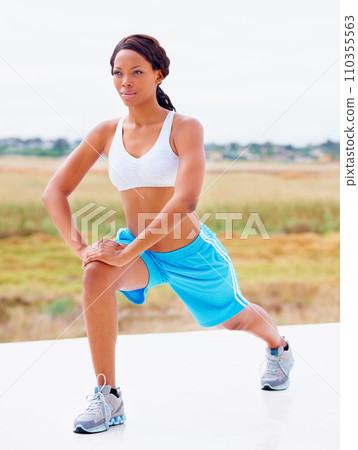 African woman, lunges and outdoor for fitness, health or muscle development for legs, summer or nature. Girl, training and exercise with thinking, vision or wellness in sunshine, countryside or field 110355563