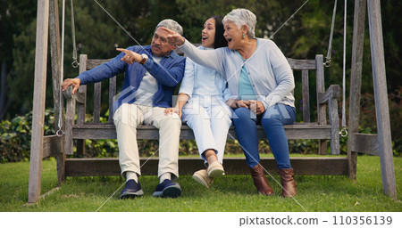 Father, senior or mother with woman on bench in nature pointing, talking or speaking in retirement. Dad, mature parents or daughter in conversation with bond together in park or garden as a family Father, senior or mother with woman on bench in nature pointing, talking or speaking in retirement. Dad, mature parents or daughter in conversation with bond together in park or garden as a family 110356139