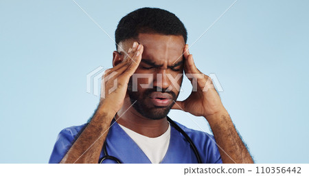 Doctor, dizzy or man in studio with headache, head pain or fatigue in medical healthcare crisis or emergency. Depression, face or tired male nurse with burnout, migraine or stress on blue background Doctor, dizzy or man in studio with headache, head pain or fatigue in medical healthcare crisis or emergency. Depression, face or tired male nurse with burnout, migraine or stress on blue background 110356442