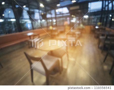Blurry background interior design bar table chair windows decorate indoor space display. Blurred background cafe coffee shop restaurant in shopping mall with light bokeh business event retail store Blurry background interior design bar table chair windows decorate indoor space display. Blurred background cafe coffee shop restaurant in shopping mall with light bokeh business event retail store 110356541