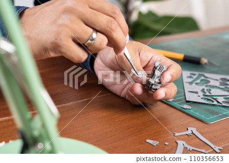 assembling cardboard model 110356653