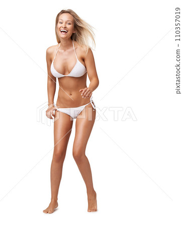 Bikini, laughing and portrait of woman in studio for skincare, wellness and diet. Swimwear, fashion and isolated happy person in summer style for vacation, holiday and excited on white background 110357019