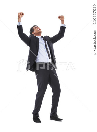 Business man, fist celebration and studio with smile for profit, revenue and bonus by white background. Entrepreneur, trader or winner person with goals, achievement and happy with yes for results 110357039