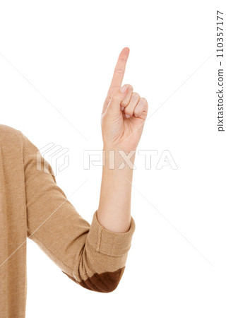 Person, hand and finger pointing with idea, solution or question on a white studio background. Closeup of raised arm for number, gesture or problem solving with answer or touch on mockup space 110357177
