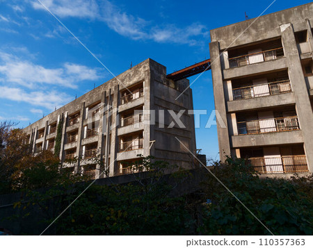 Abandoned eight-story apartment building on Ikejima Abandoned eight-story apartment building on Ikejima 110357363