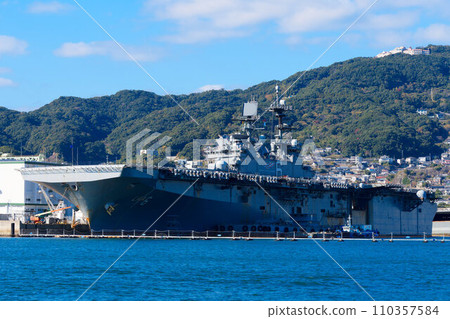 Amphibious assault ship America anchored in Sasebo Port 110357584
