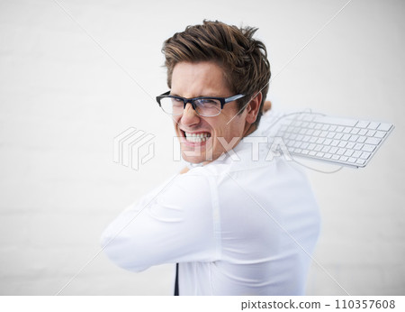 Man, angry and hitting with keyboard, boss and portrait to employee for work, report or job. Frustrated, employer and furious on white background, problem or failure with bad news, stress or risk 110357608