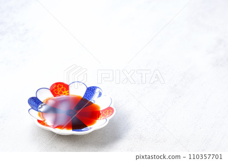 A small plate poured with soy sauce 110357701