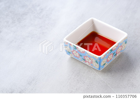 A small plate poured with soy sauce 110357706