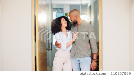 Home, hug and couple with doorway, funny and marriage with relationship, bonding and romance. Apartment, people and man with woman, embrace or happiness with humor, smile and laughing with date 110357999