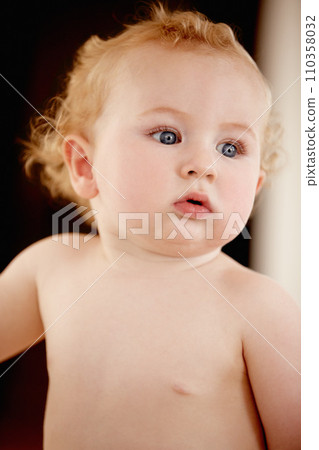 Calm, face and baby in a house for playing, watching or fun, learning, walk or balance. Little, child development and curious boy kid in a nursery playful, standing and enjoy youth, freedom or game 110358032