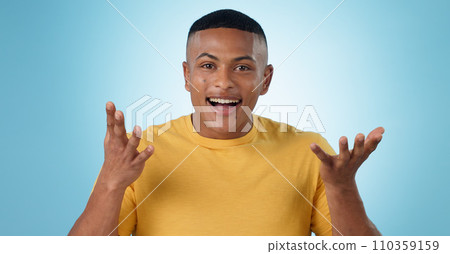 Young man, wow and excited face for news in studio with college announcement, results or learning opportunity. Happy portrait of student in surprise, shock or questions for college on blue background 110359159