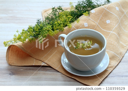 Herbal tea from herb Galium verum, also known as lady's bedstraw or yellow bedstraw Herbal tea from herb Galium verum, also known as lady's bedstraw or yellow bedstraw 110359329
