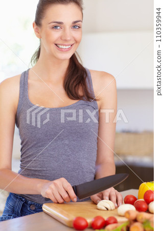 Woman, portrait and happy with knife or vegetables for nutrition, cooking or healthy meal in kitchen of home. Person, face and chopping board with mushroom, tomato and carrots for wellness and diet Woman, portrait and happy with knife or vegetables for nutrition, cooking or healthy meal in kitchen of home. Person, face and chopping board with mushroom, tomato and carrots for wellness and diet 110359944