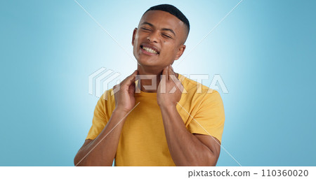 Stress, neck pain and man in studio with burnout, muscle or joint crisis on blue background. Shoulder, injury and face of male model with anxiety for arthritis, fibromyalgia or osteoporosis tension Stress, neck pain and man in studio with burnout, muscle or joint crisis on blue background. Shoulder, injury and face of male model with anxiety for arthritis, fibromyalgia or osteoporosis tension 110360020