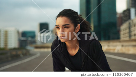 Woman, athlete and thinking outdoor for fitness, exercise or wellness with city background or nature. Runner, person or mindfulness for workout, training and healthy body with sportswear in town road 110360407