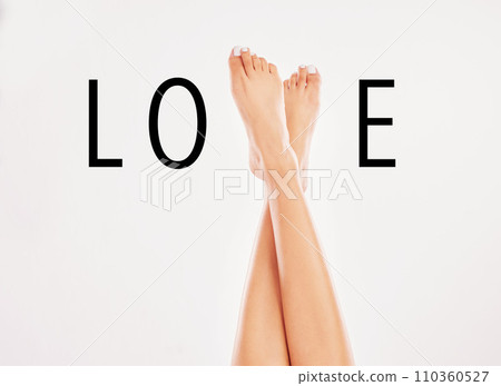 These legs could have you staring all day. a woman showing off her legs against a grey background. These legs could have you staring all day. a woman showing off her legs against a grey background. 110360527
