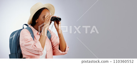 Woman, binoculars and explore on adventure, studio and travel or backpack by gray background. Black person, vacation and holiday in mockup, watch and search on journey, gear and equipment for tourist 110360552