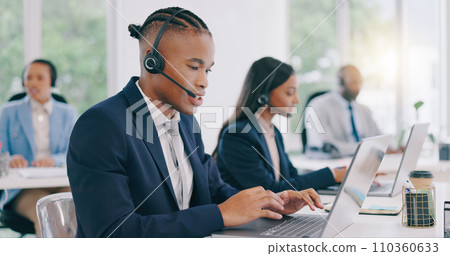 Business people, telemarketing and call center with laptop, black man and customer service. Staff, group or professional with headphones, typing and internet with advice, tech support and help desk 110360633