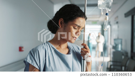 Sad, breathing and a woman with an iv drip at hospital for medicine, wellness and recovery from virus. Depression, thinking and a clinic patient with treatment stress, burnout or anxiety while sick 110360653