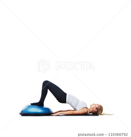 Woman, lying and workout on bosu ball for exercise, training or abs on a white studio background. Active female person on half round object for pilates, practice or strong core on mockup space Woman, lying and workout on bosu ball for exercise, training or abs on a white studio background. Active female person on half round object for pilates, practice or strong core on mockup space 110360792