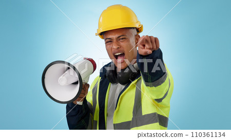 Construction worker, builder or angry man with megaphone in studio for renovation or development. Speaking, pointing or male engineer shouting in building project or communication on blue background Construction worker, builder or angry man with megaphone in studio for renovation or development. Speaking, pointing or male engineer shouting in building project or communication on blue background 110361134