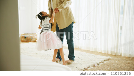 Home, dancing and father with girl, happiness and relax with family, cheerful and celebration. Dad, parent and kid with joy, childhood or bonding together with love, steps and move with fun or ballet 110361236