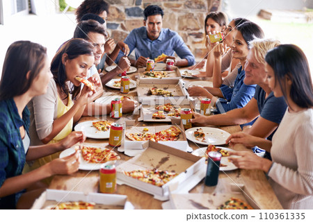 Whats better than pizza with friends. a group of friends enjoying pizza together. Whats better than pizza with friends. a group of friends enjoying pizza together. 110361335