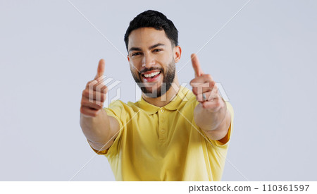 Thumbs up, portrait and man in studio for winner, achievement and celebrate deal on white background. Happy indian model, emoji and like sign for yes feedback, promotion and thank you for excellence 110361597