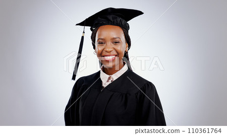 Graduate, black woman and portrait with smile from college and academy achievement in studio. Happy, university student and school success with white background and African female person with study 110361764