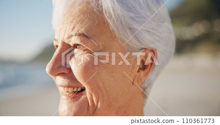 Senior woman, smile and sunset at a beach with peace outdoor in nature, sea and elderly female person with mindfulness. Relax, happy and calm old lady thinking by the ocean on holiday in retirement 110361773