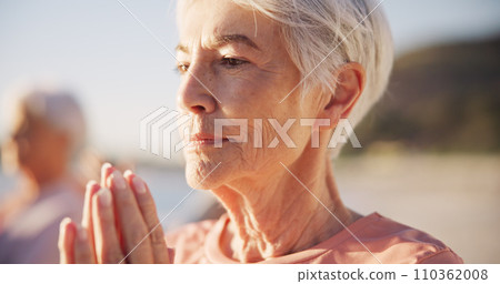 Beach yoga class, face or senior woman doing exercise, wellness breathing and learning mindfulness workout in nature. Freedom, relax or elderly person pose, morning fitness and coach teaching pilates 110362008