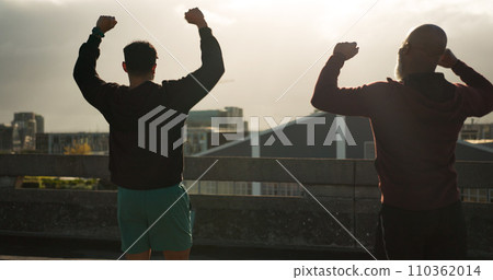 Man, winner and team fitness in city for workout, training or success in outdoor exercise together. Male person, athlete or friends in winning celebration, teamwork or achievement in an urban town 110362014