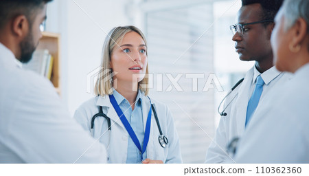Group, professional woman and doctors meeting, planning or cooperation on medical help, clinic service or healthcare. Discussion, leader and team surgeon, nurses or medicine expert consulting on plan 110362360