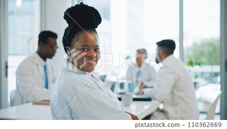 Portrait, black woman and doctors in a meeting, smile and healthcare with planning, hospital and teamwork. Face, professional and group with management staff, conversation and talking with medicare Portrait, black woman and doctors in a meeting, smile and healthcare with planning, hospital and teamwork. Face, professional and group with management staff, conversation and talking with medicare 110362669