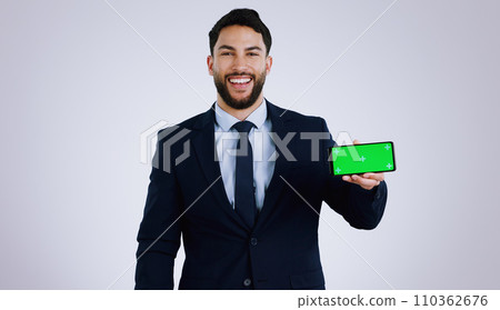 Professional man, mobile green screen and space for social media, software or online subscription in studio. Portrait of business worker on phone, website mockup or contact info on a white background 110362676