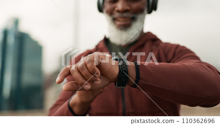 Man, hands and smart watch in city for fitness, cardio exercise results and workout performance. Closeup, sports gear and runner check timer, stopwatch clock and progress for healthy training outdoor 110362696