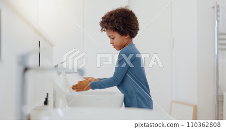 Child, tap and washing or cleaning hands for hygiene, bacteria or germ removal in sink at home. Little boy or kid rinsing soap in bathroom, water or basin for disinfection or cleanliness at house Child, tap and washing or cleaning hands for hygiene, bacteria or germ removal in sink at home. Little boy or kid rinsing soap in bathroom, water or basin for disinfection or cleanliness at house 110362808