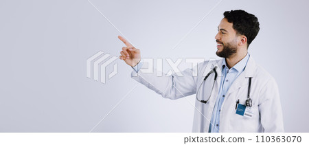 Smile, man and doctor pointing at presentation, show mockup and space on a white background. Happy medical professional gesture at advertising, announcement or information, healthcare and marketing Smile, man and doctor pointing at presentation, show mockup and space on a white background. Happy medical professional gesture at advertising, announcement or information, healthcare and marketing 110363070