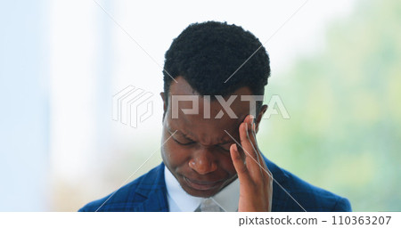 Business, man or headache in office with stress, burnout or risk in corporate company from migraine. Black person, employee or entrepreneur and tired, anxiety or discomfort from strain at workplace 110363207