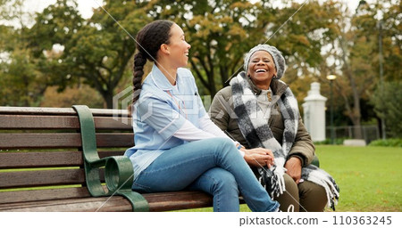 Nurse, retirement and park with old woman in a wheelchair for happy, elderly care and physical therapy. Trust, medical and healthcare with senior patient and caregiver in nature for rehabilitation 110363245