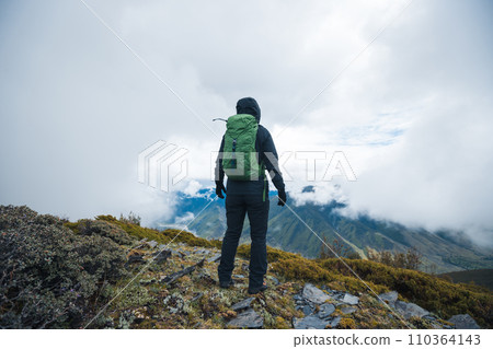 Hiking woman on high altitude mountain top Hiking woman on high altitude mountain top 110364143