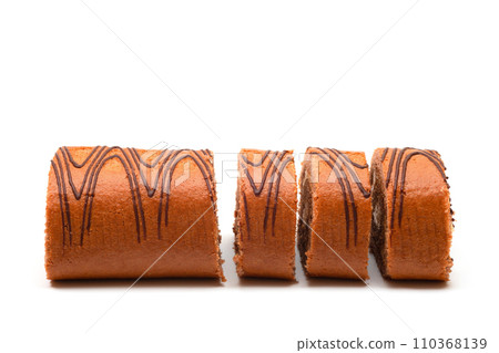 Vanilla sponge cake with chocolate cream isolated on white. Vanilla sponge cake with chocolate cream isolated on white. 110368139