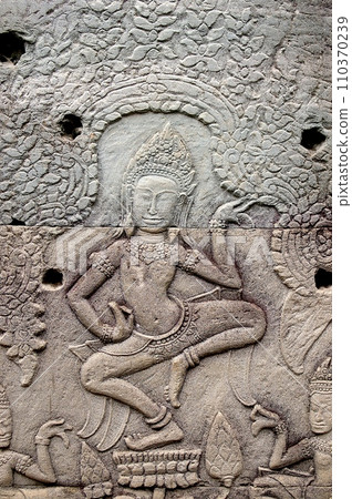 Angkor Wat dancer relief Angkor Wat dancer relief 110370239