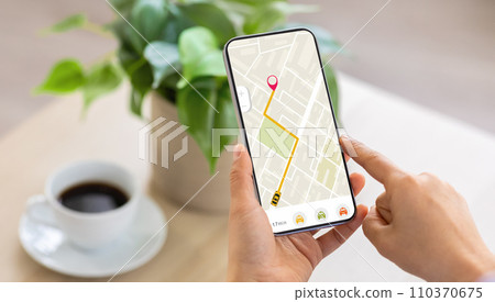 Cropped of woman using navigation mobile app on smartphone 110370675