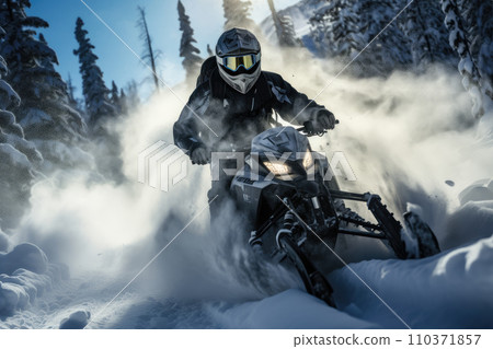 A well equipped man with helmet and snow goggles driving snowmobile in snowy forest 110371857
